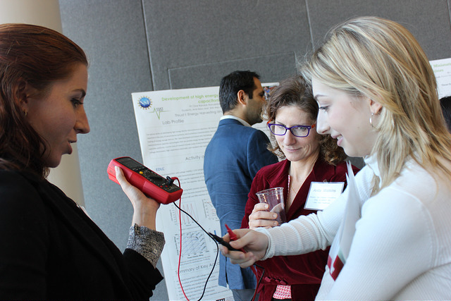 Amanda Myers, Graduate Research Assistant at ASSIST, demonstrates a prototype to Anita Watkins, Chair of the Industry Advisory Board, and Alex Obiol, Park Scholar Class of 2022