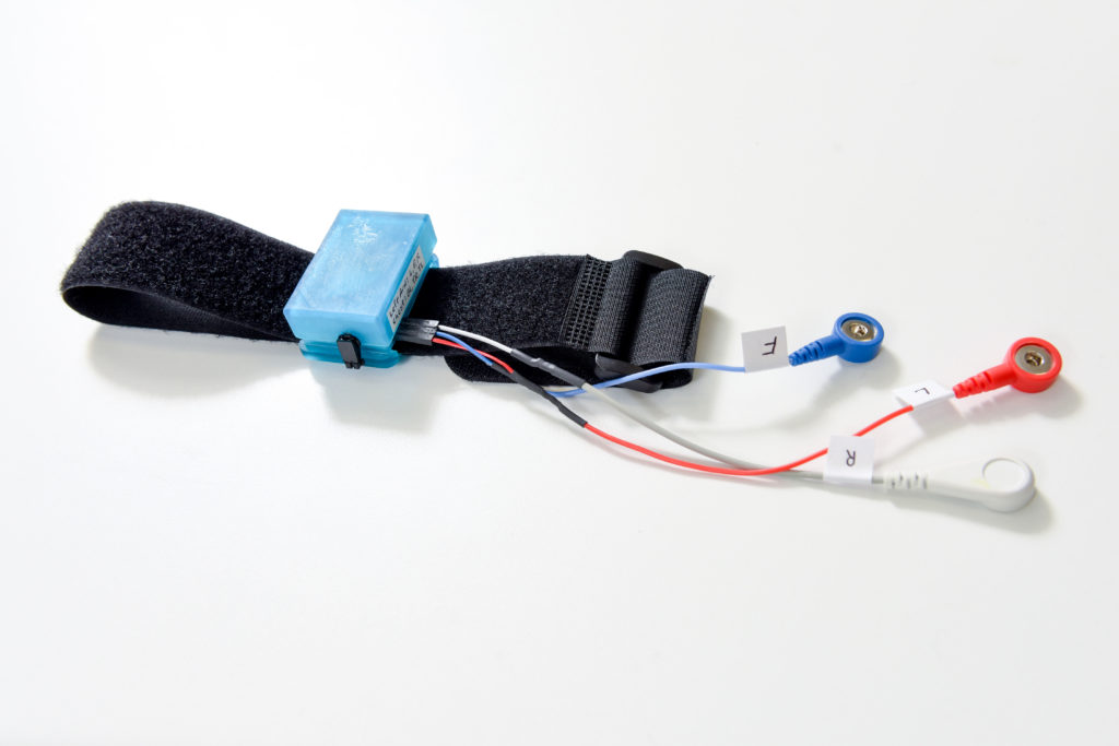 ECG monitor with BLE radio demonstrates cardiac monitoring from the arm.