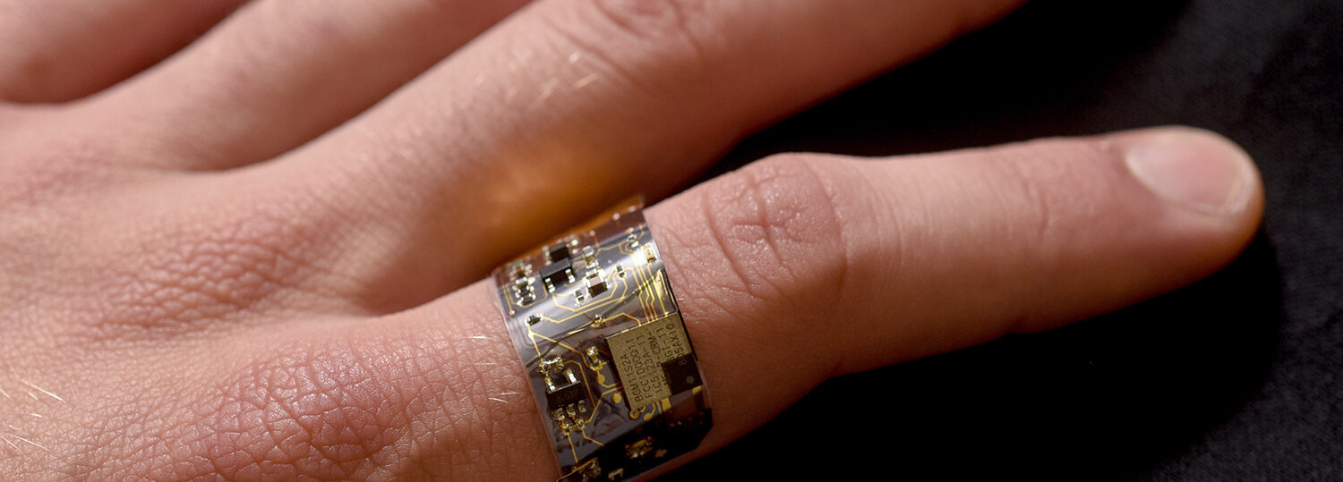Flexible circuit for wearable sensor resting on hand